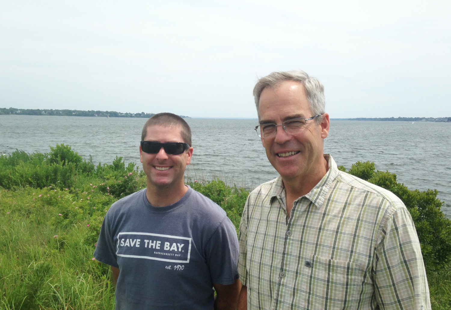 Baykeeper Mike Jarbeau and Executive Director Jonathan Stone outside Save The Bay headquarters in Providence.